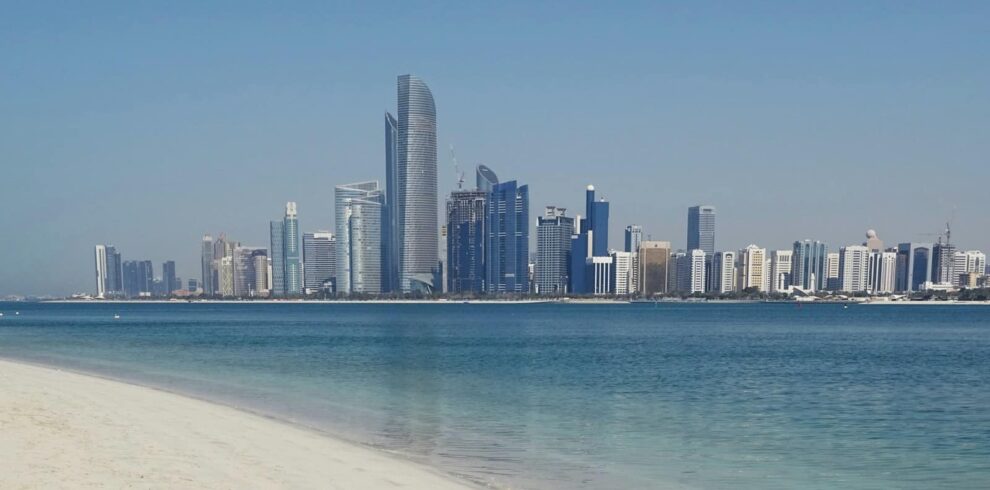 city skyline across the sea during daytime